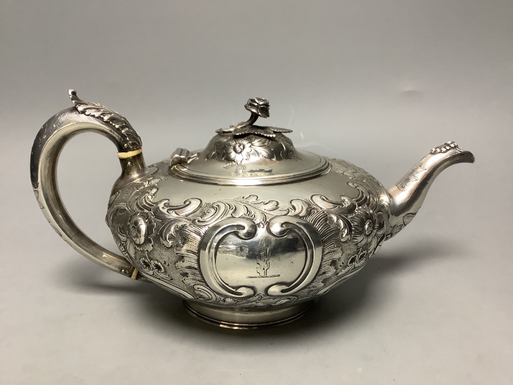 A Victorian embossed silver squat melon shaped teapot, Walter Morrise, London, 1846, height 14.1cm